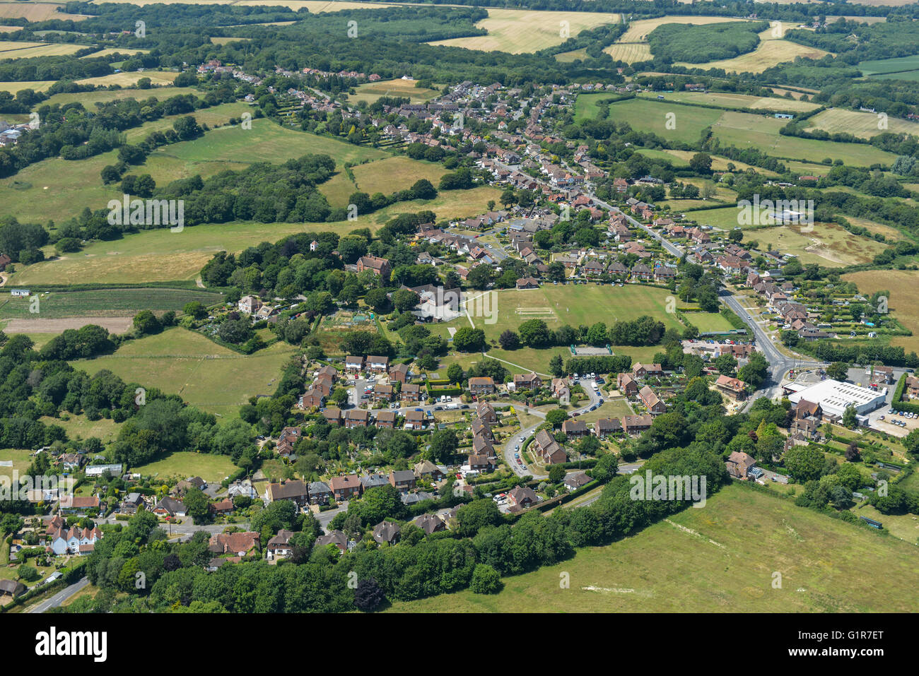 An aerial view of the village of Ninfield and surrounding East Sussex countryside Stock Photo