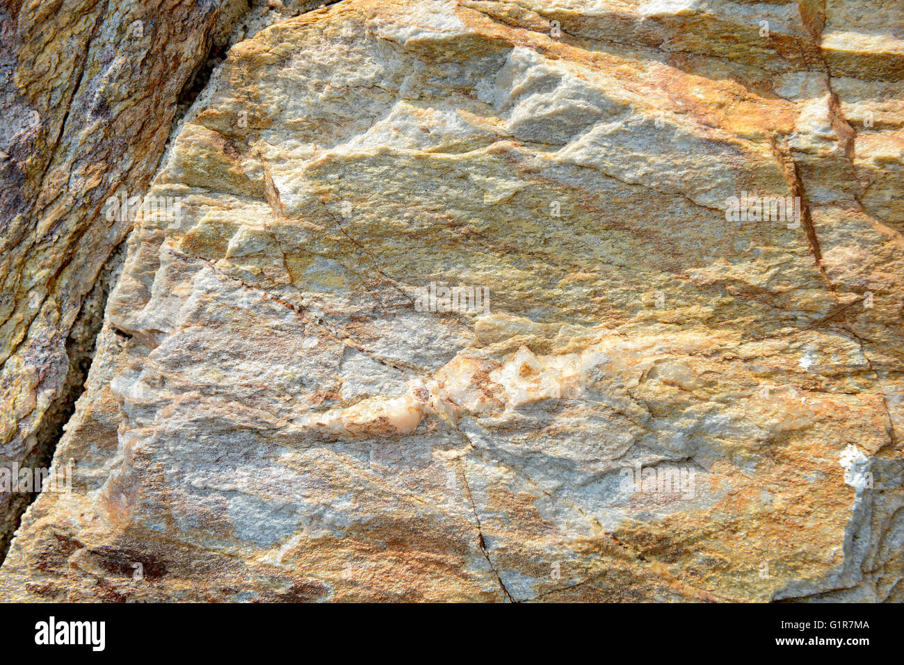 Brown stone wall texture and background Stock Photo - Alamy