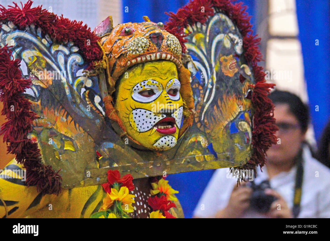 Tiger Mask Dance performed by local tribals of Simlipal Tiger Reserve forest in an auditorium in Kolkata, West Bengal, India Stock Photo