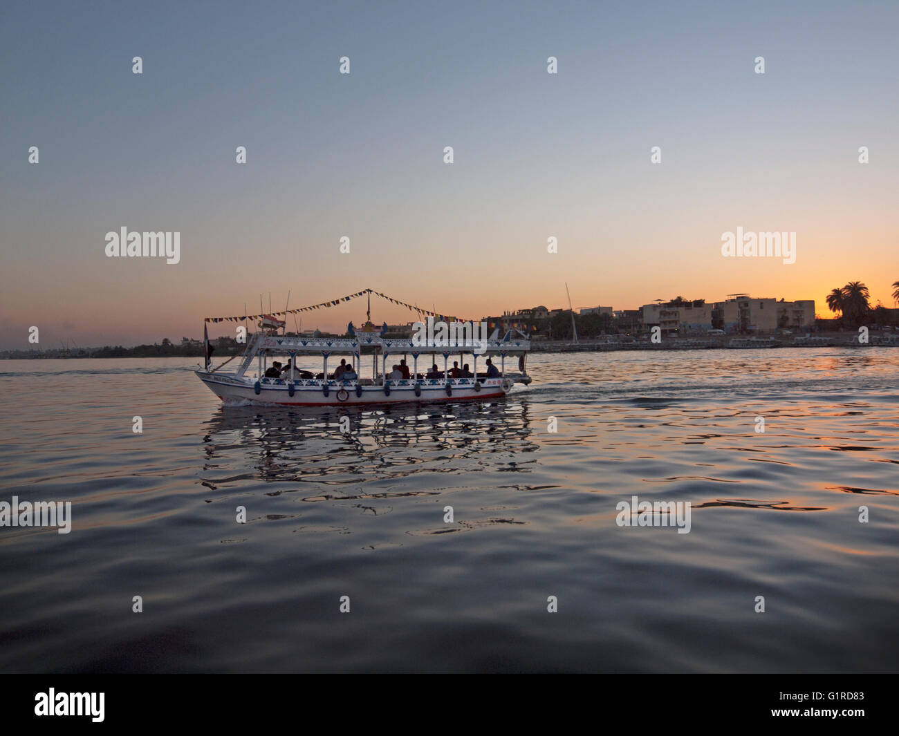 A boat crosses the River Nile at Luxor, Egypt Stock Photo - Alamy