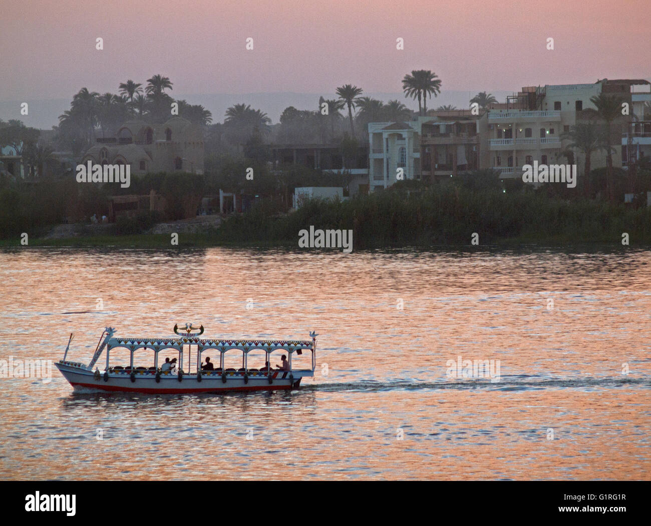 A boat crosses the River Nile at Luxor, Egypt Stock Photo - Alamy