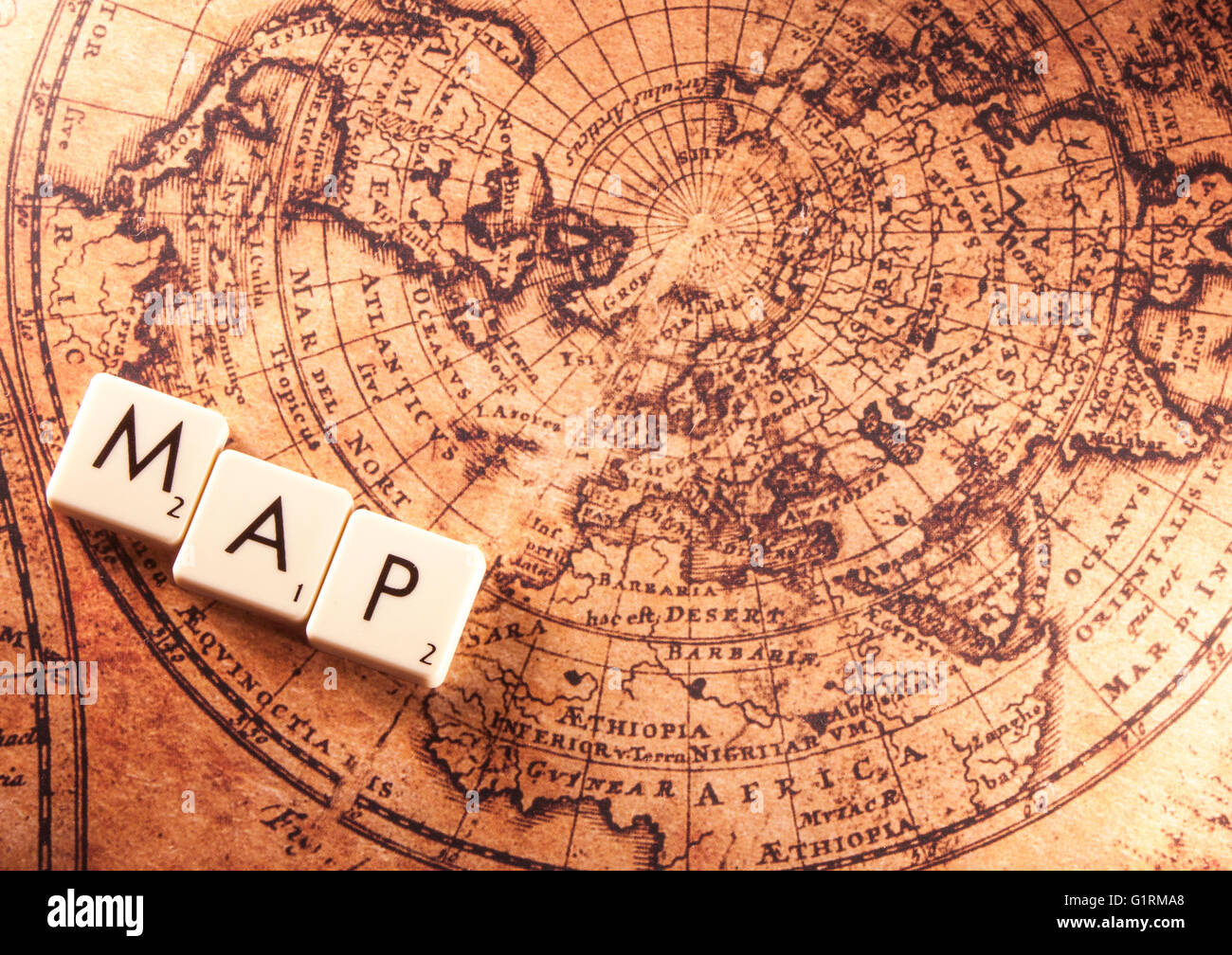 The white text map on a brown world map Stock Photo