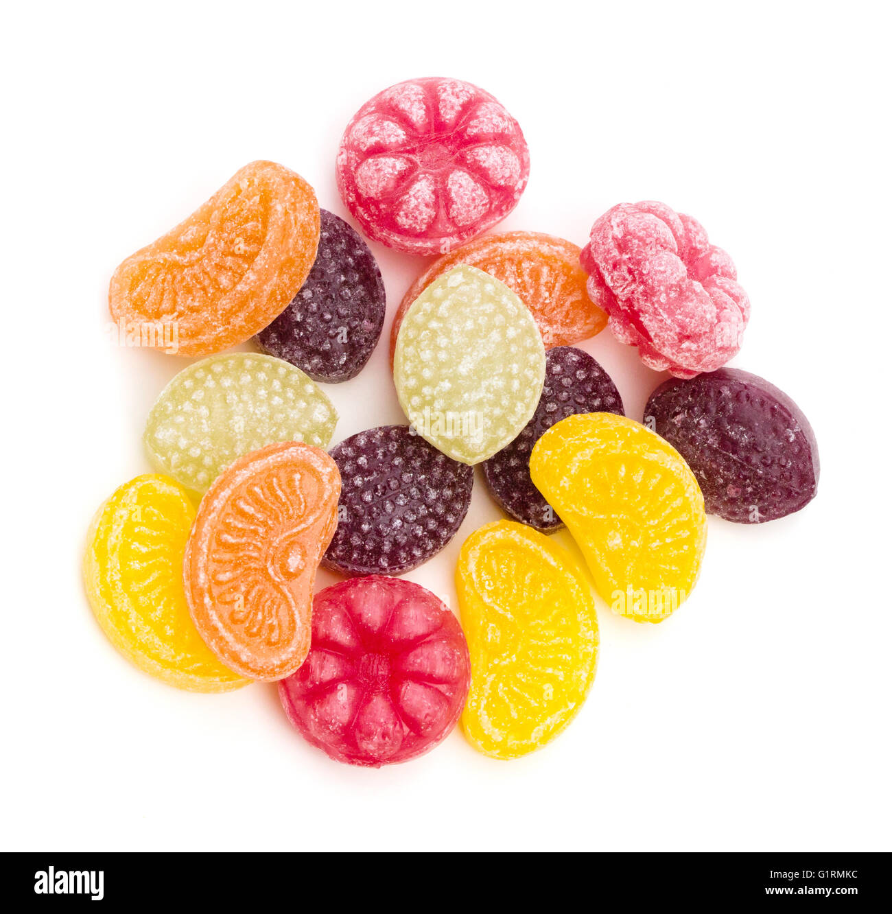 An assortment of fruit flavored hard candy on a white background Stock Photo