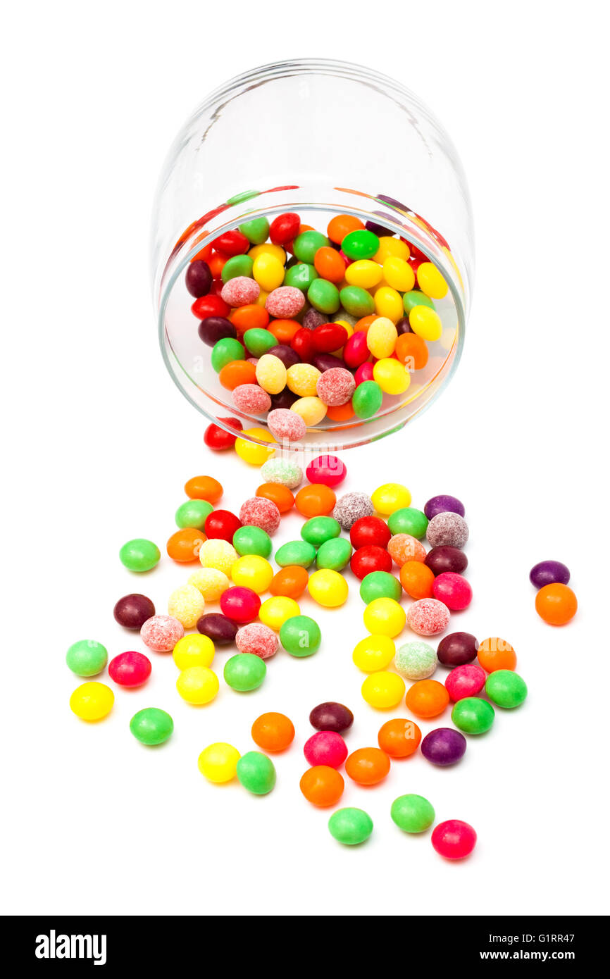 Candy in a glass jar on white background Stock Photo - Alamy