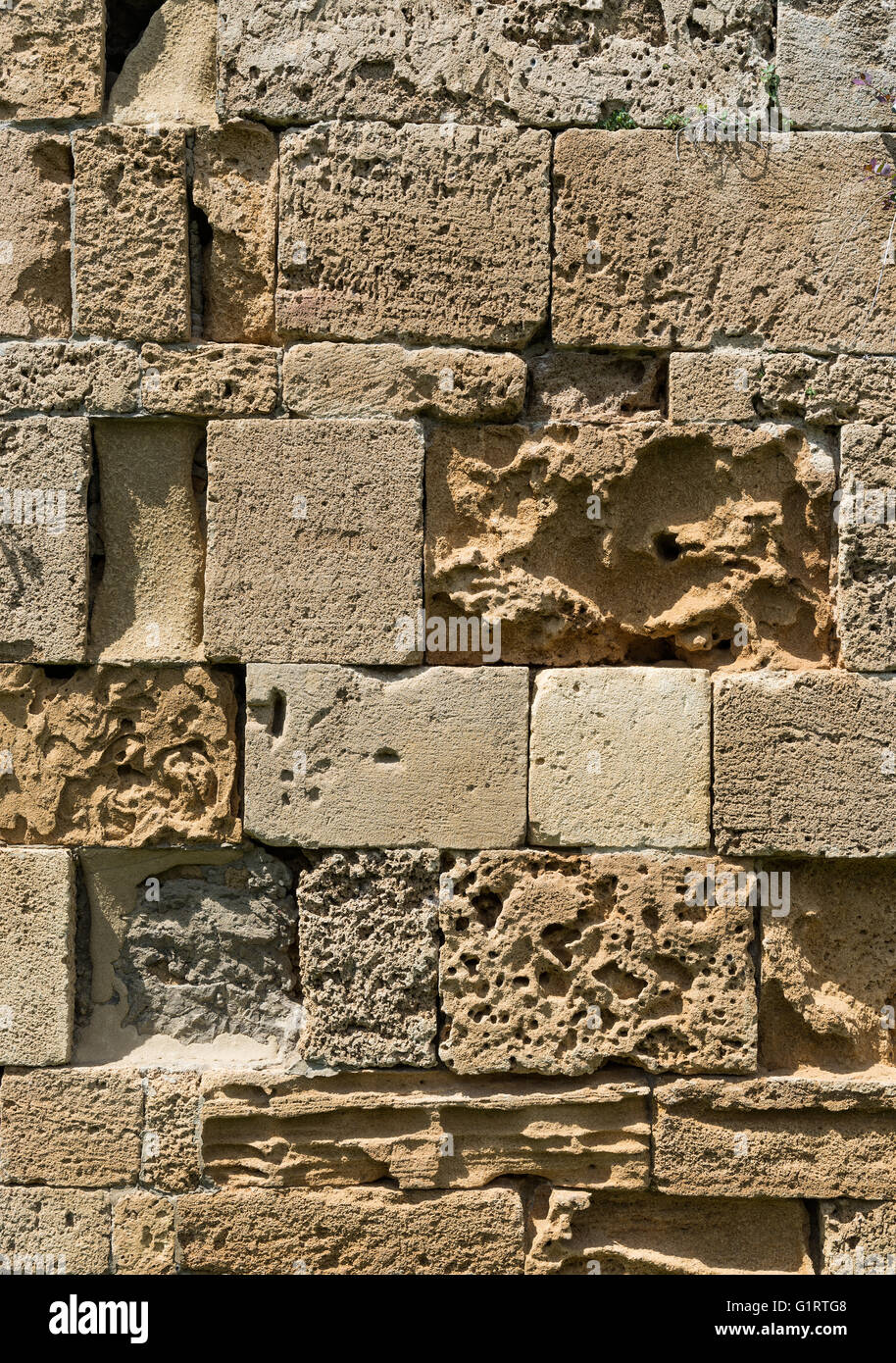 Old wall of hewn stone, Piazza del Duomo, Piazza dei Miracoli, Province of Pisa, Tuscany, Italy Stock Photo