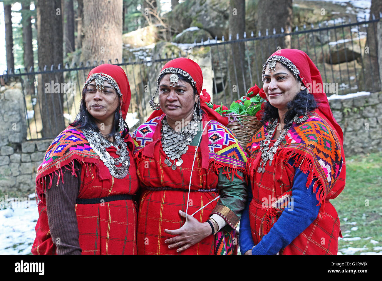 Manali, India: Adult women dressed in the traditional tribal attire, pattoo, of Kullu valley in the Himalayan mountain ranges. Stock Photo