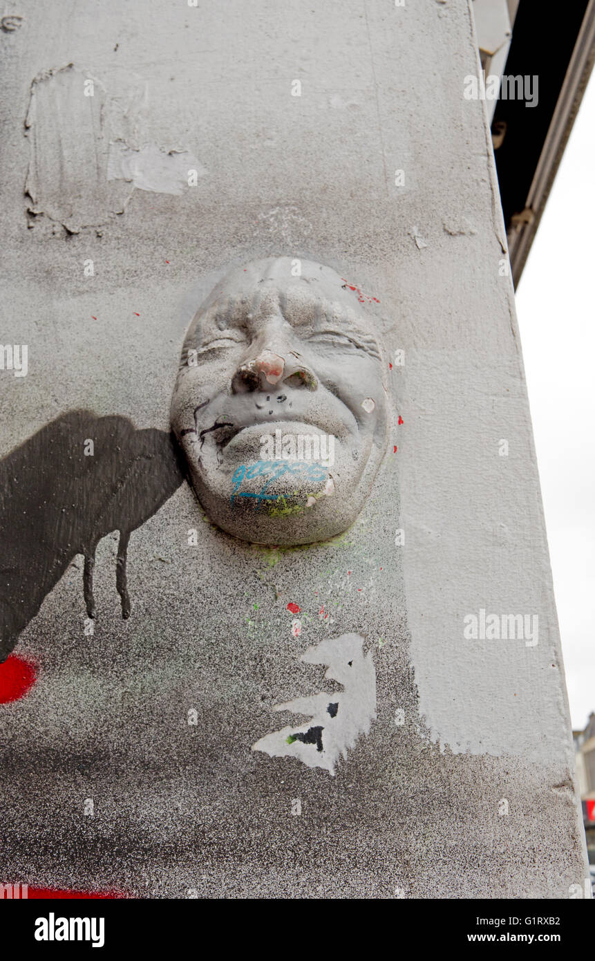 Street art of Gregos face on wall in Camden Town, London. Stock Photo