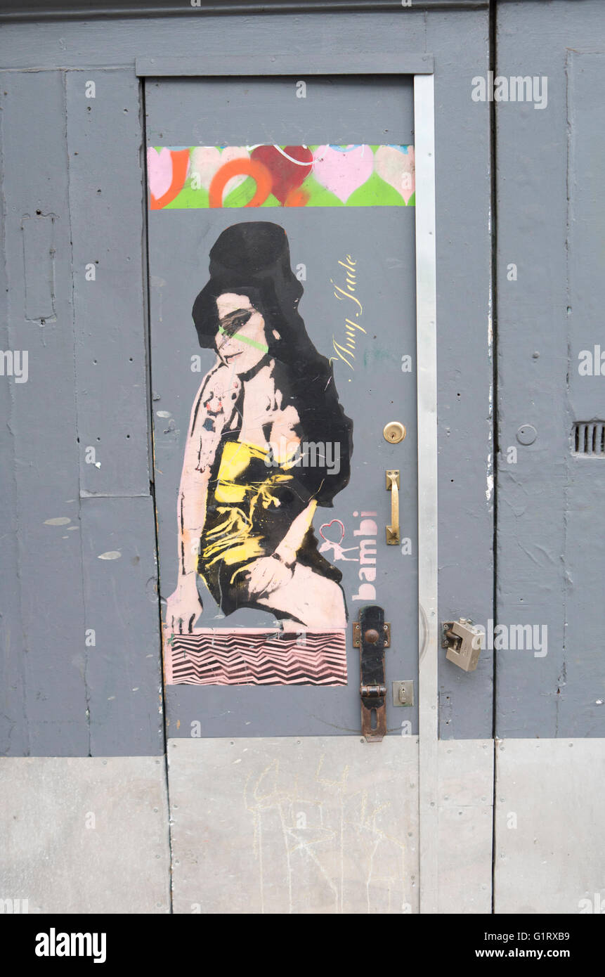 Amy Winehouse graffiti on a Camden door Stock Photo