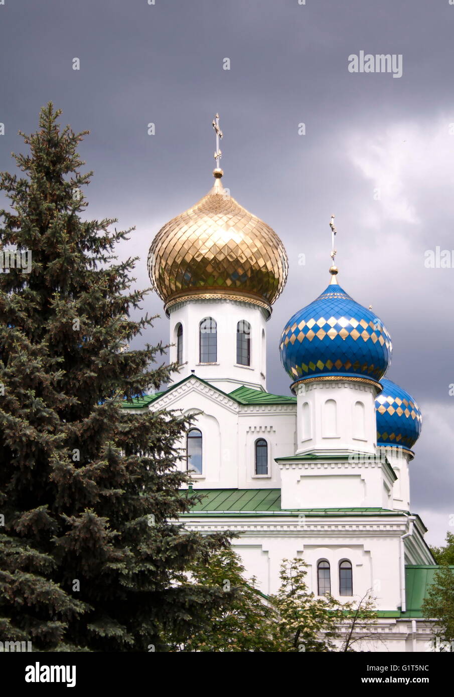 Domes of Orthodox Church on background of cloudy sky Stock Photo - Alamy