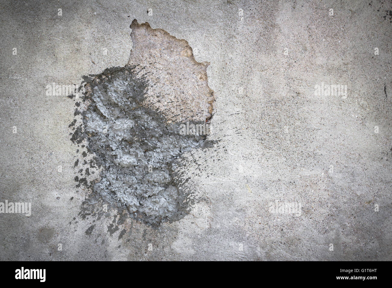 Hole in the wall filled with concrete patch Stock Photo Alamy