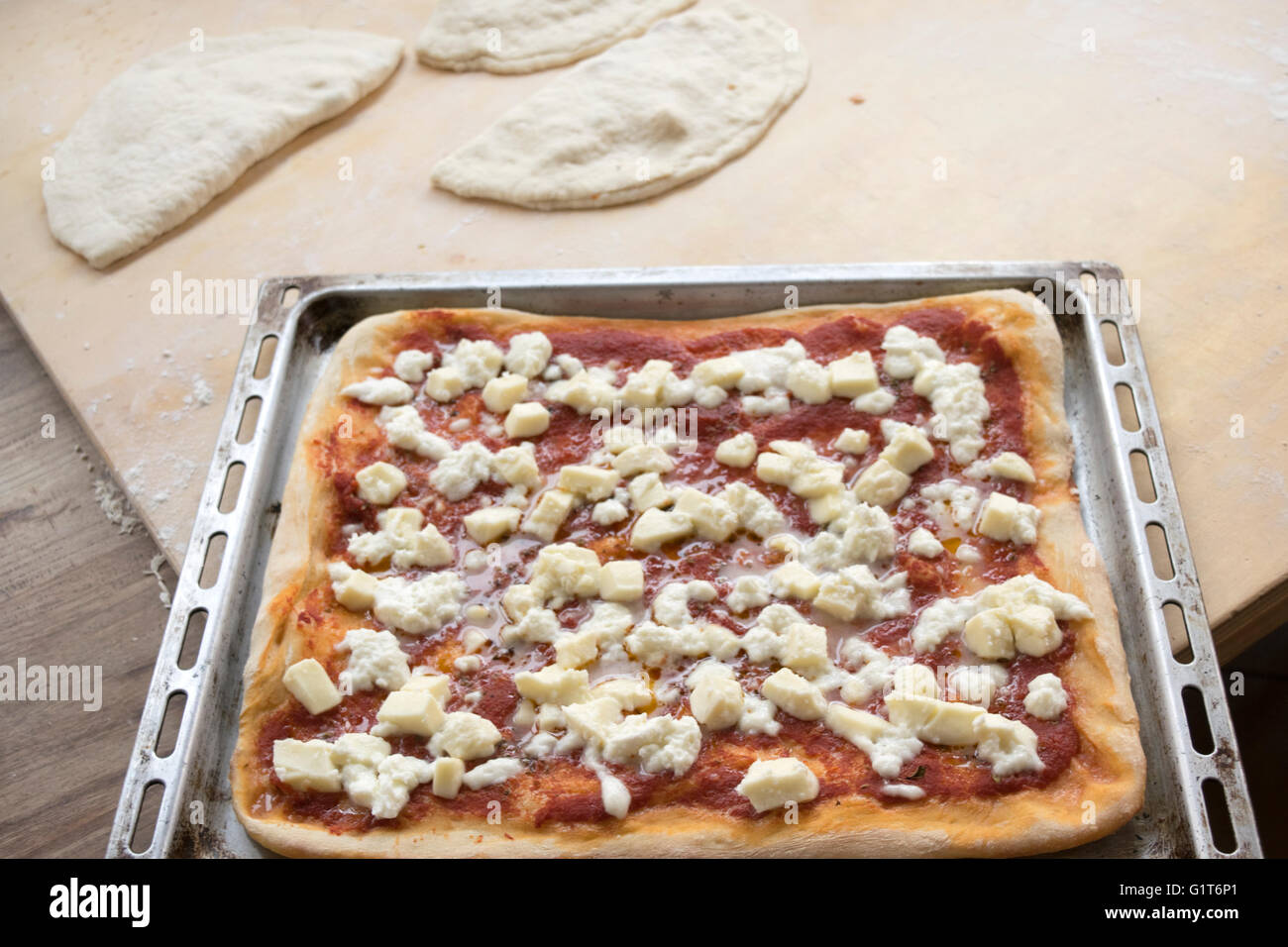 homemade margherita pizza with fresh mozzarella in a pan pizza Stock Photo
