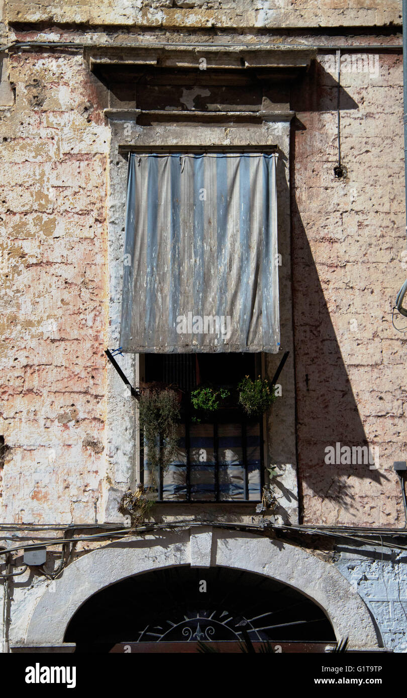 Window with awning drawn for shade Stock Photo Alamy