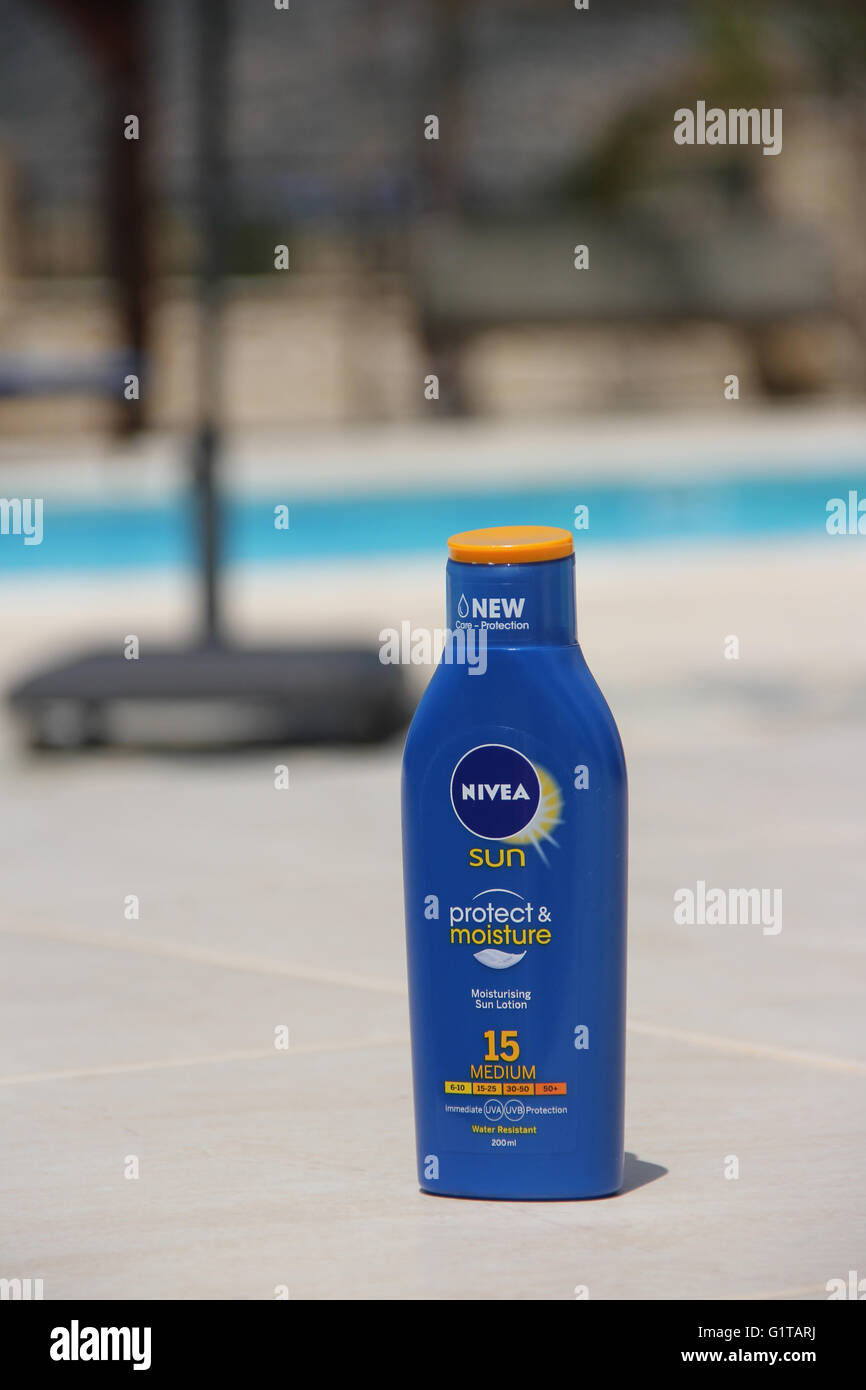 A bottle of Sun Lotion ready to use Stock Photo