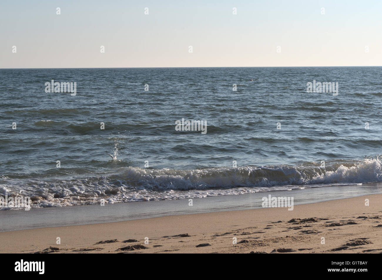 Beach waves coming. Summertime and vacation destinations Stock Photo