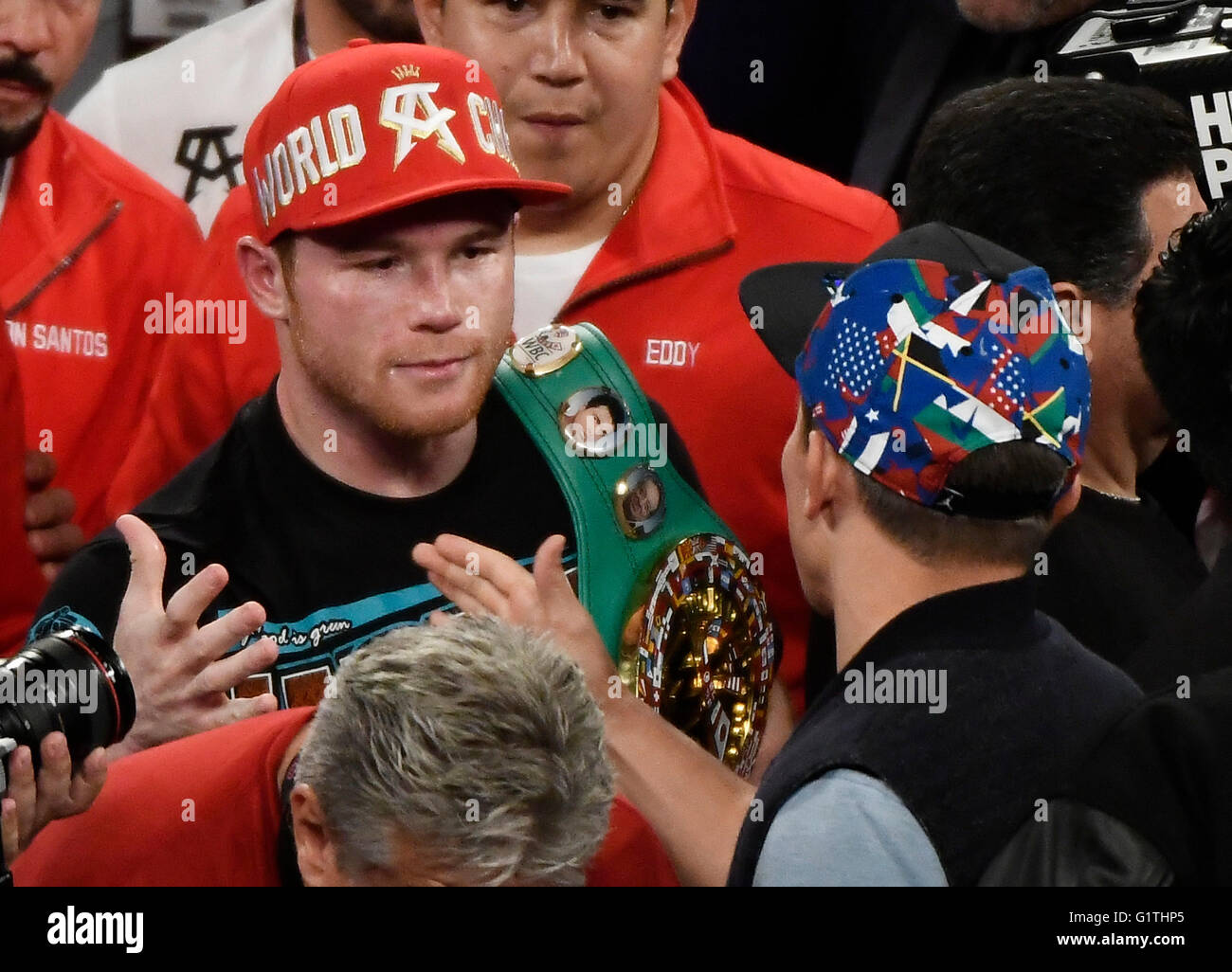 (L) Mexico's Canelo Alvarez meets up with GGG at the end of the fight after he KO Amir Khan in the 6th round for the middleweight world championship back on May 7th. Today May 18th it was announce by Canelo Alvarez ''After much consideration, today, I instructed my team at Golden Boy Promotions to continue negotiating a fight with Gennady 'GGG' Golovkin and to finalize a deal as quickly as possible. I also informed the WBC that I will vacate its title. For the entirety of my career, I have taken the fights that no one wanted because I fear no man. Never has that been more true than today Stock Photo