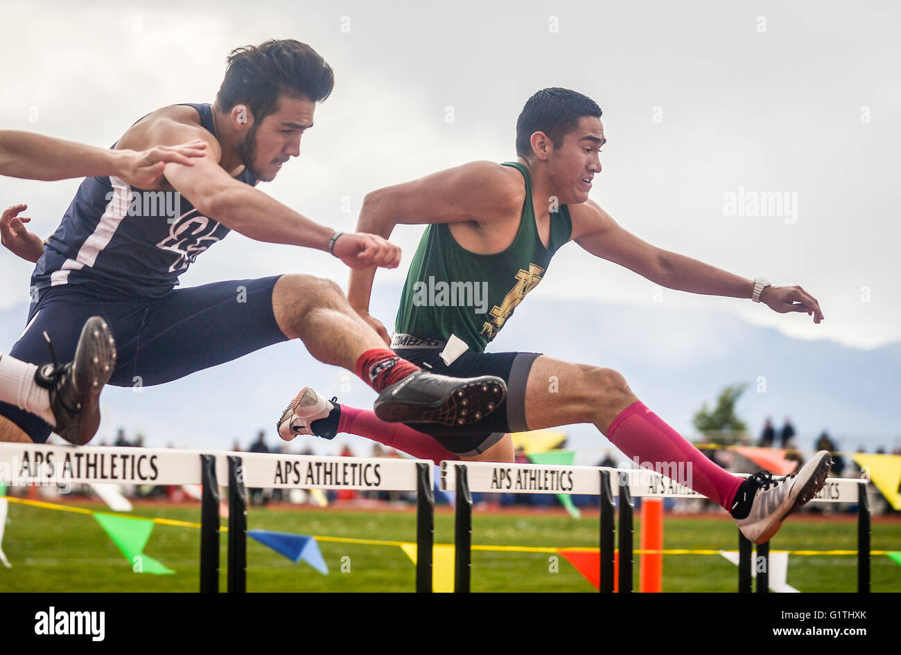 Albuquerque, New Mexico, USA. 29th Apr, 2016. Journal.Josh Foley(Cq), left, of Rio Rancho is edged at the last hurdle by Atrisco Heritage's Rogelio Morales(cq), right, in the boys 110 meter hurdles final of the Metro Championship track and field meet Friday afternoon at Community Stadium.Albuquerque, New Mexico © Roberto E. Rosales/Albuquerque Journal/ZUMA Wire/17�Թ����� Live News Stock Photo