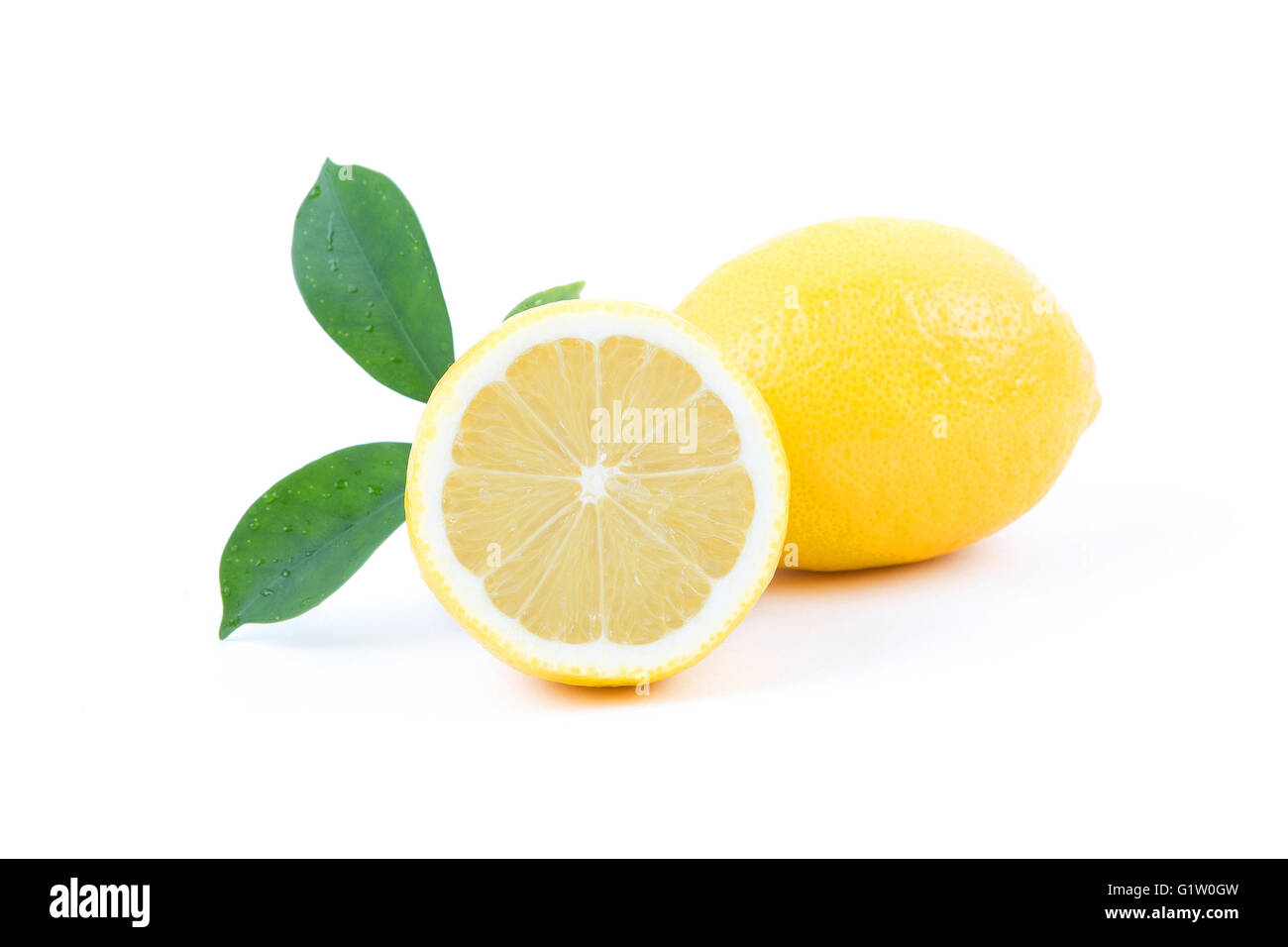 Fresh lemons with leaves on a white background Stock Photo