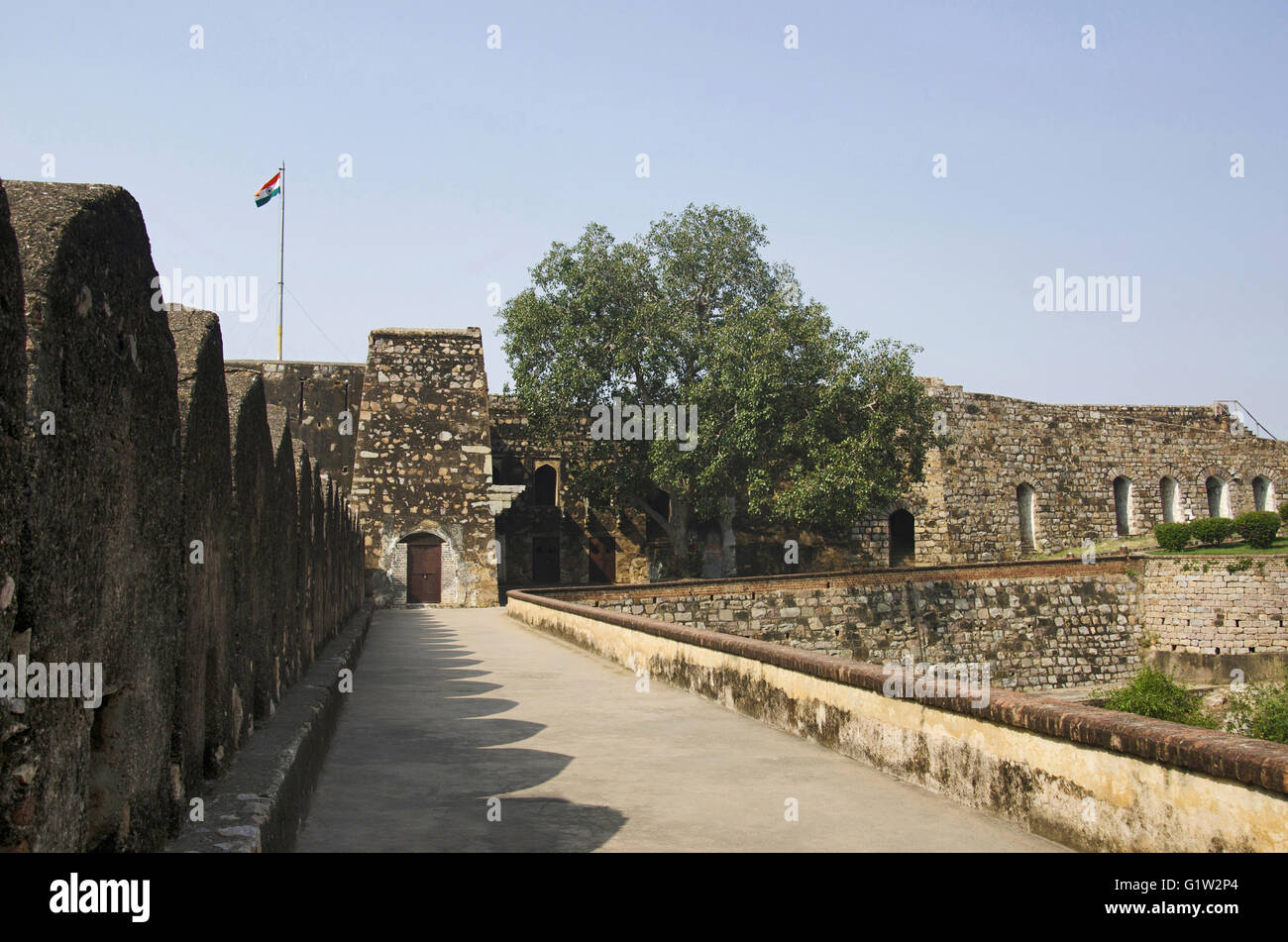 Tiranga (Indian Tricolour) and inner view of Jhansi Fort (Jhansi ka Kila), Jhansi, Uttar Pradesh, India Stock Photo