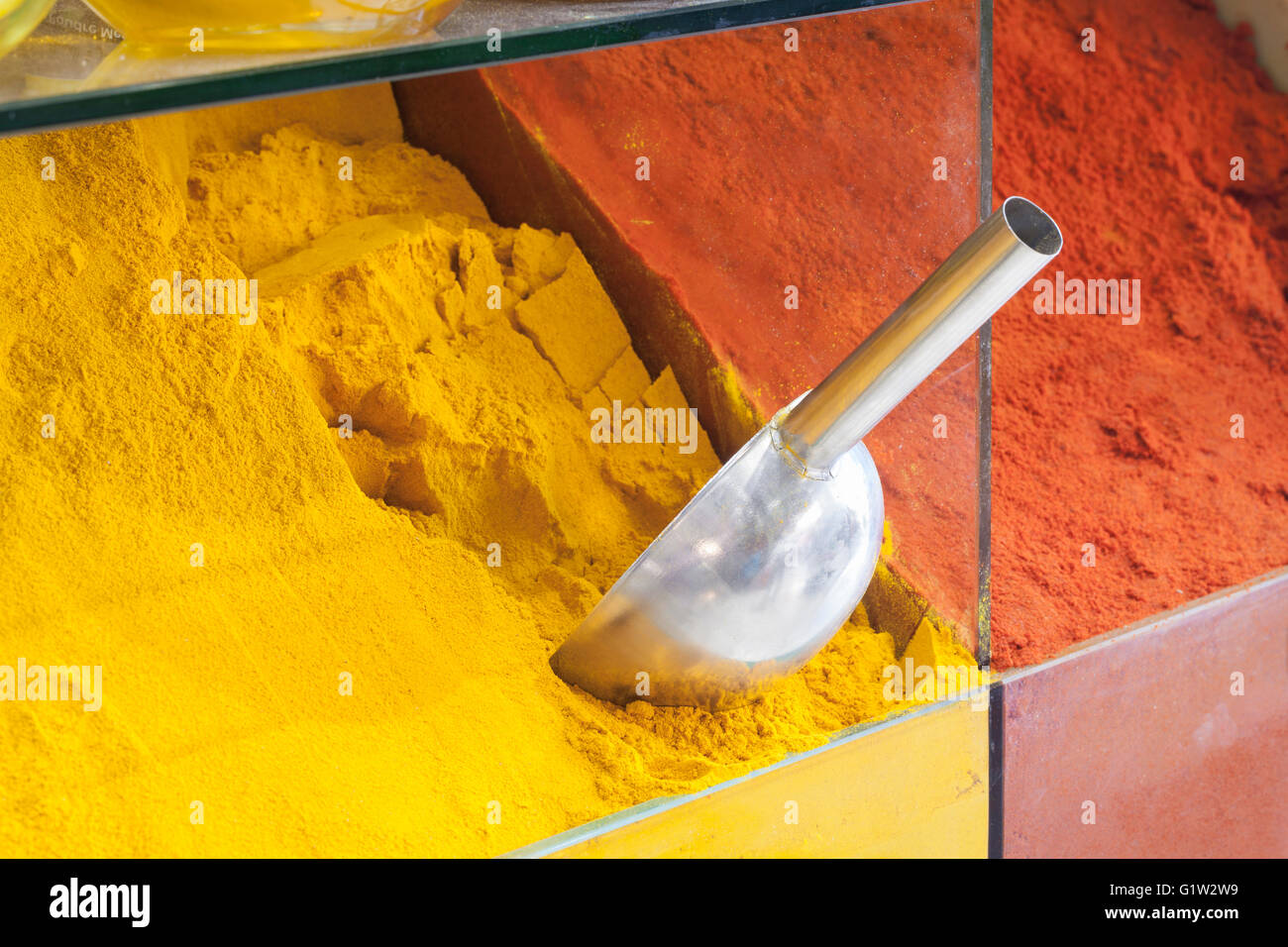 Curry powders for sale at the spice market, Marrakech, Morocco Stock Photo