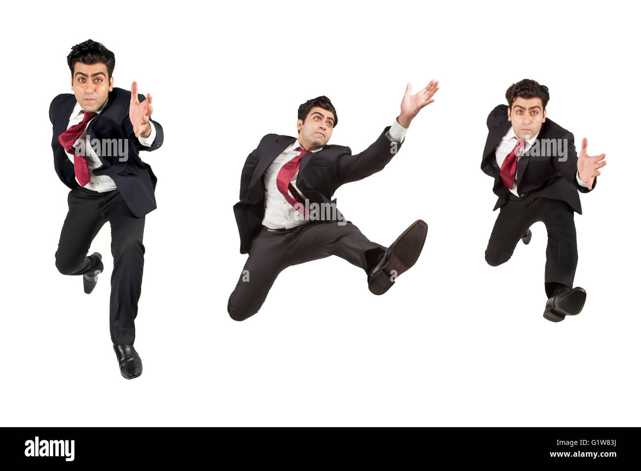 Man in suit jumping running in various angles Stock Photo Alamy