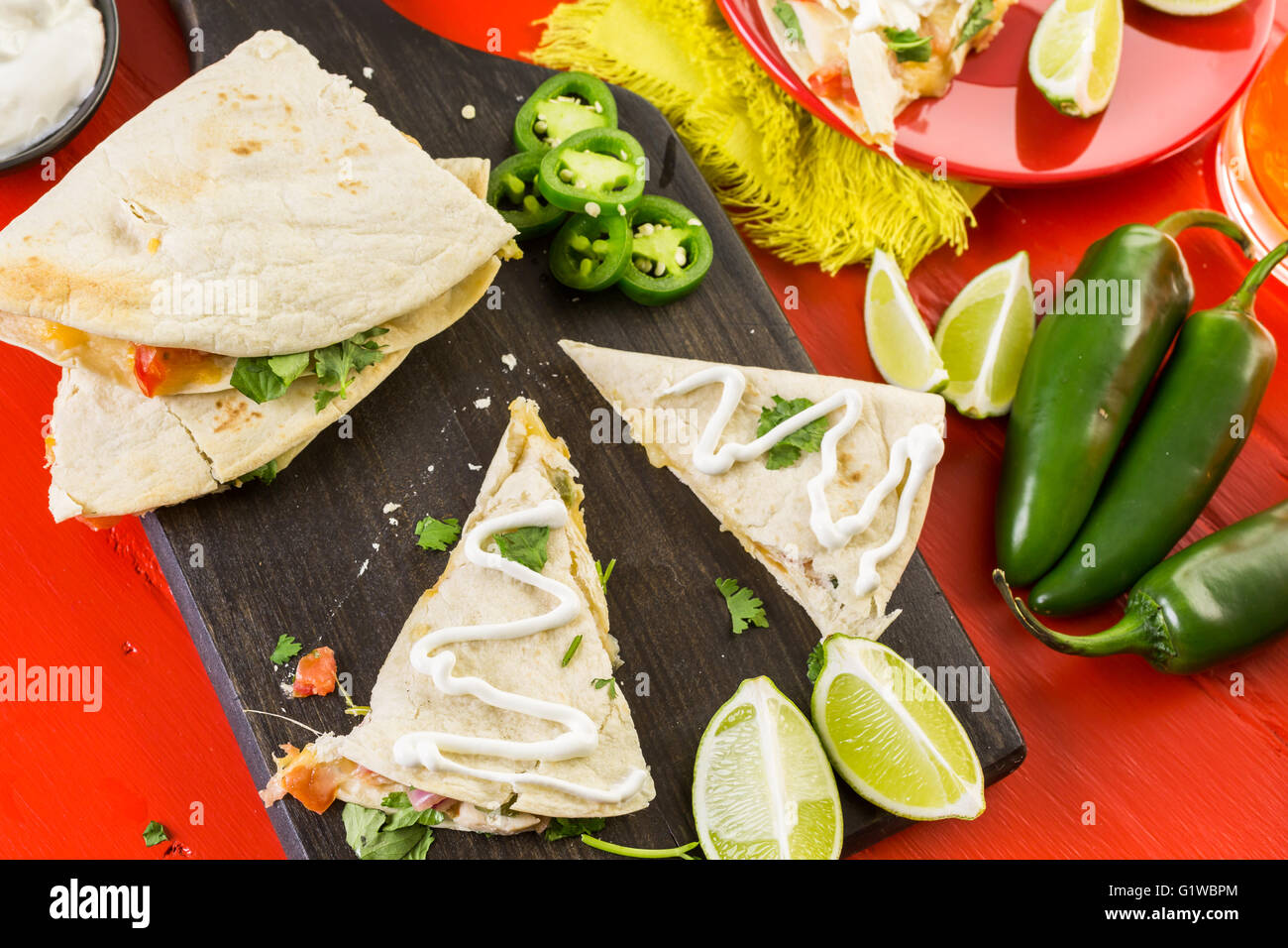 Sliced quesadilla filled with cheese, chicken and pico de gallo Stock