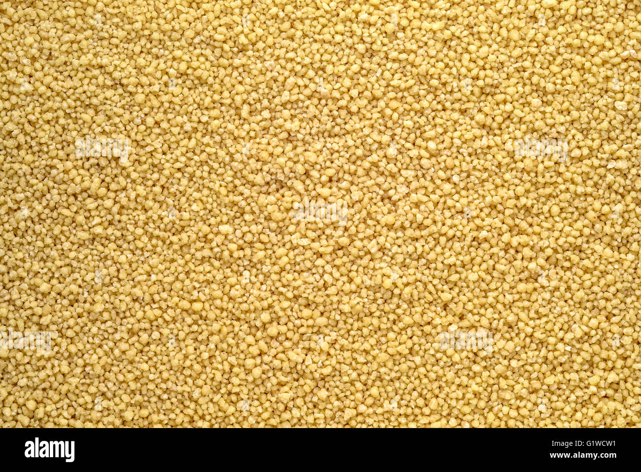 raw couscous background texture closeup Stock Photo