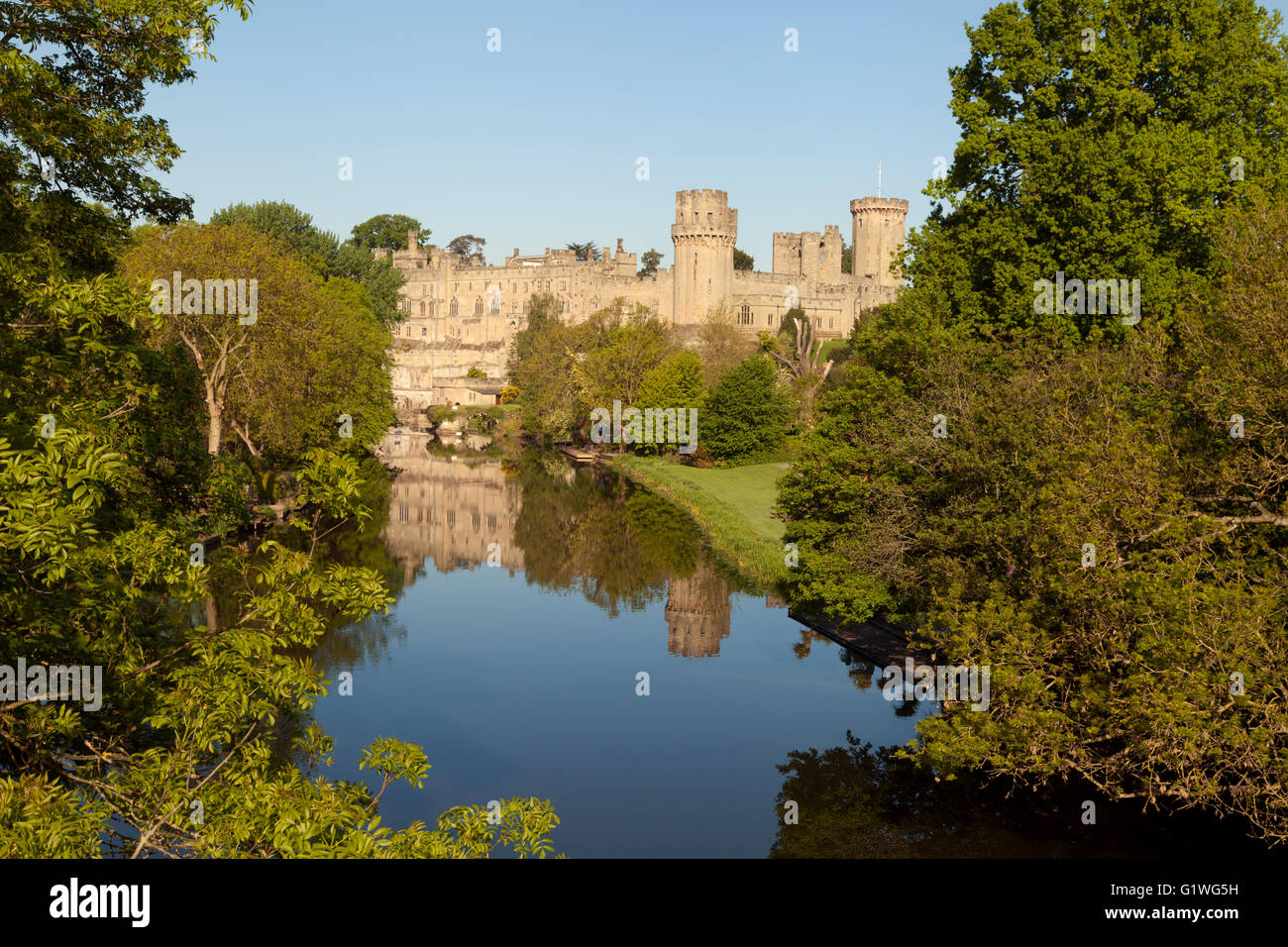 Warwick Castle, a medieval castle dating from the 11th century, and the River Avon, Warwick, Warwickshire England UK Stock Photo