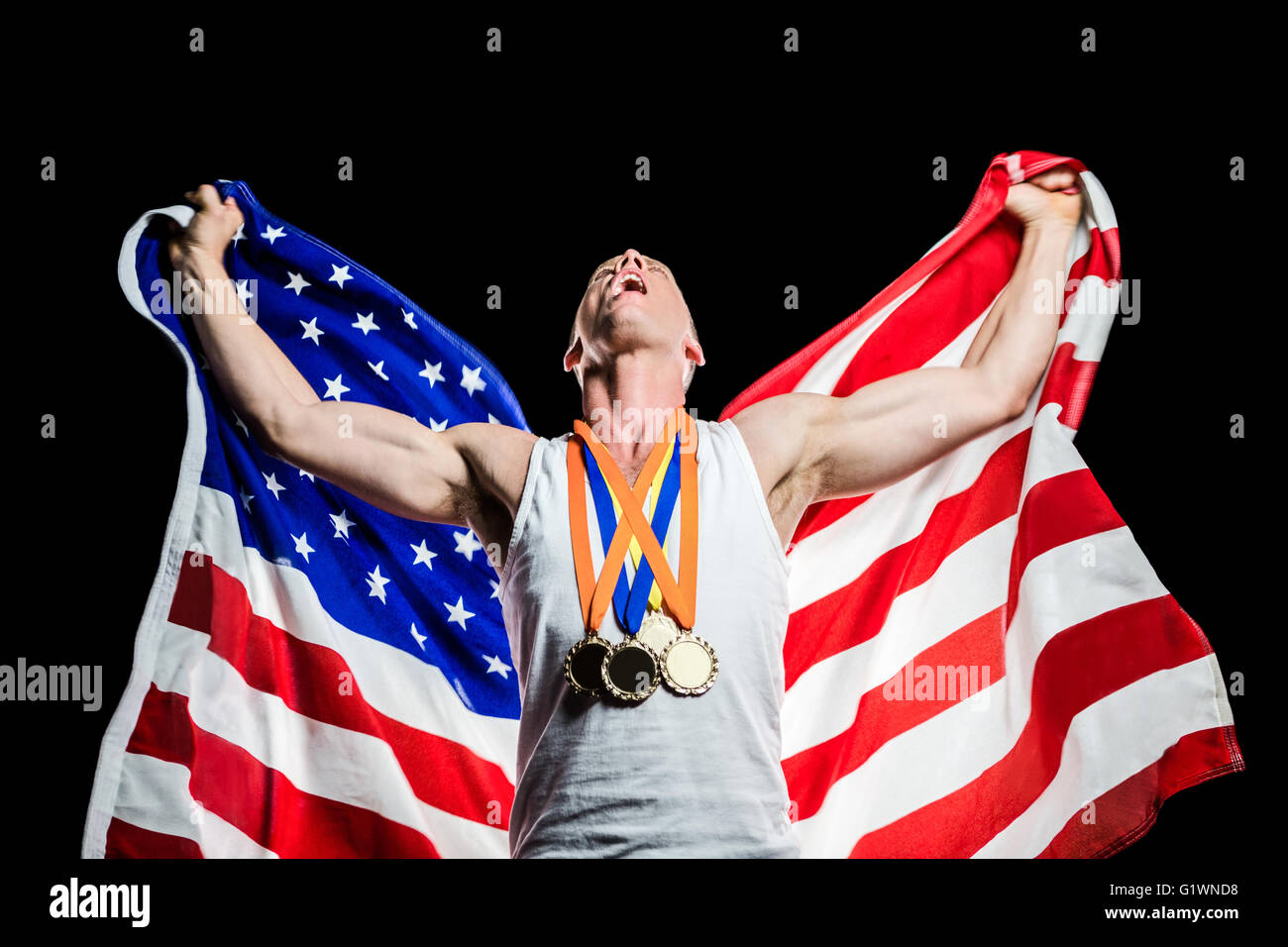 Athlete posing with gold medals after victory Stock Photo - Alamy