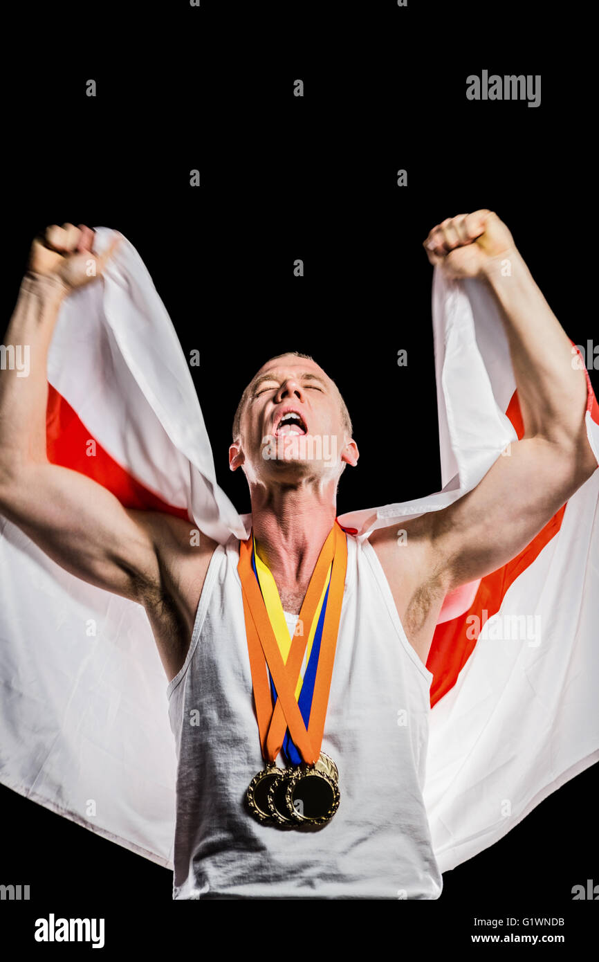 Athlete posing with gold medals after victory Stock Photo - Alamy