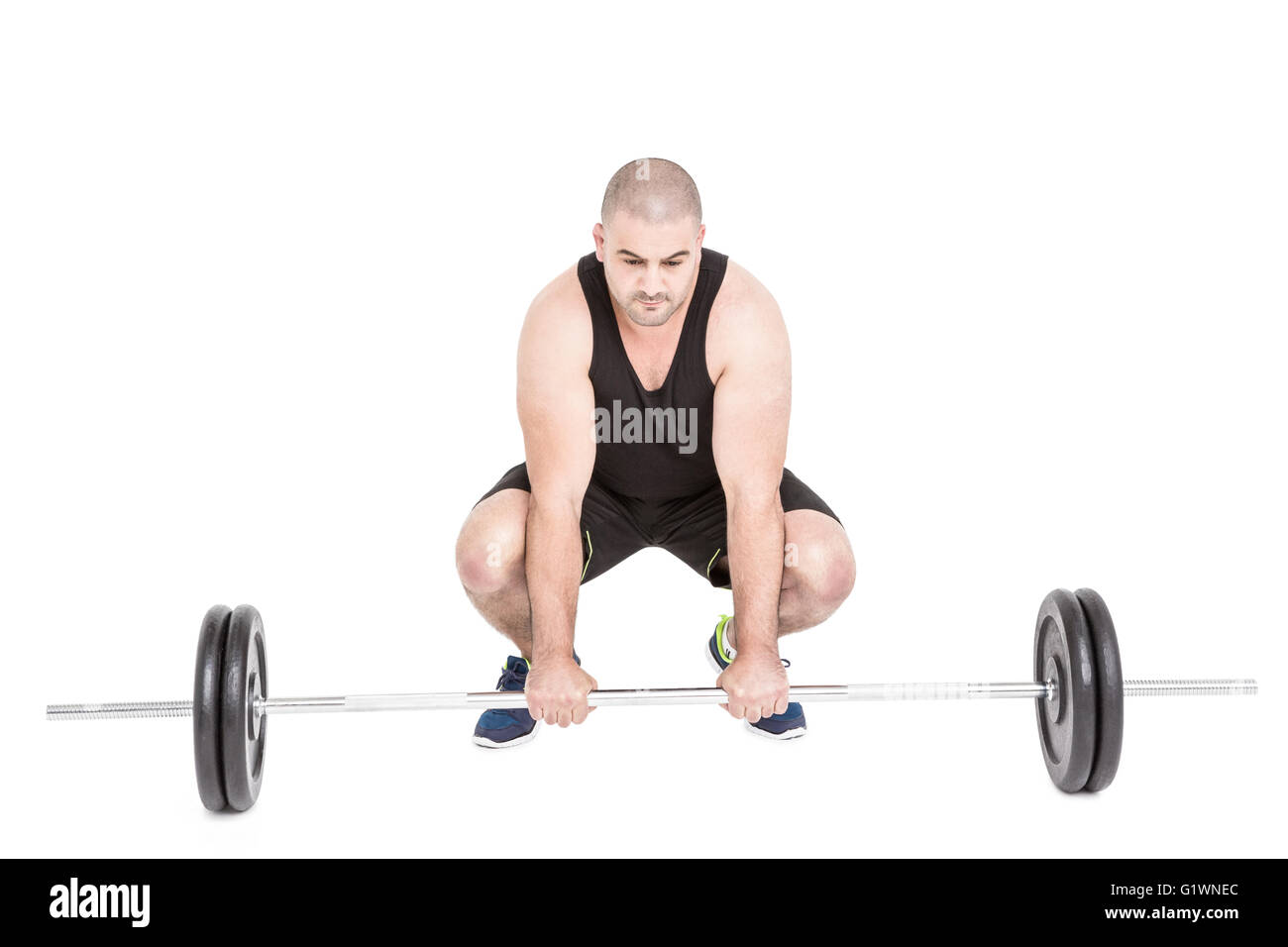 Bodybuilder lifting heavy barbell weights Stock Photo Alamy