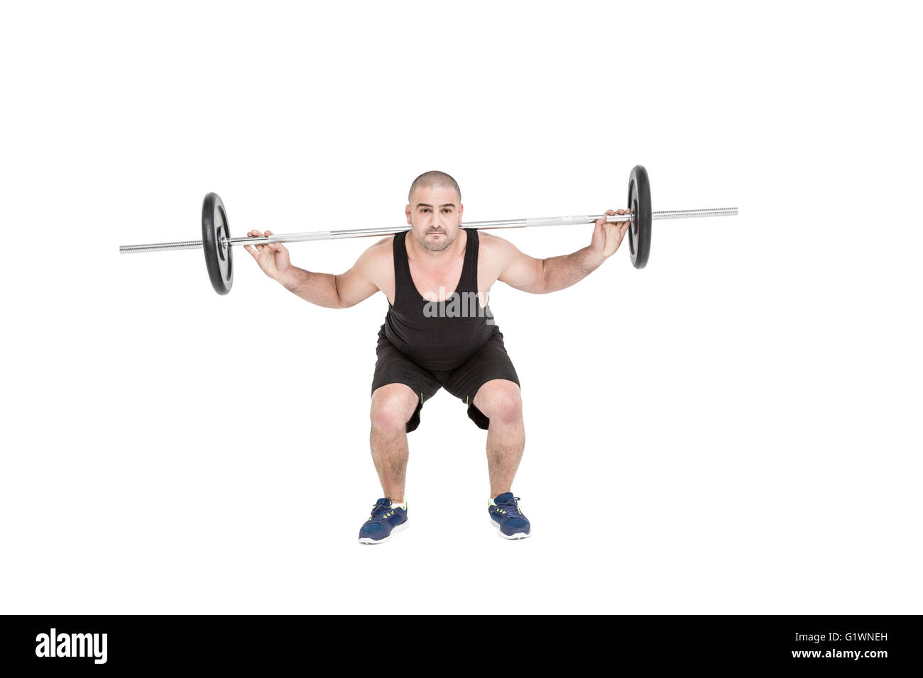 Bodybuilder lifting heavy barbell weights Stock Photo Alamy