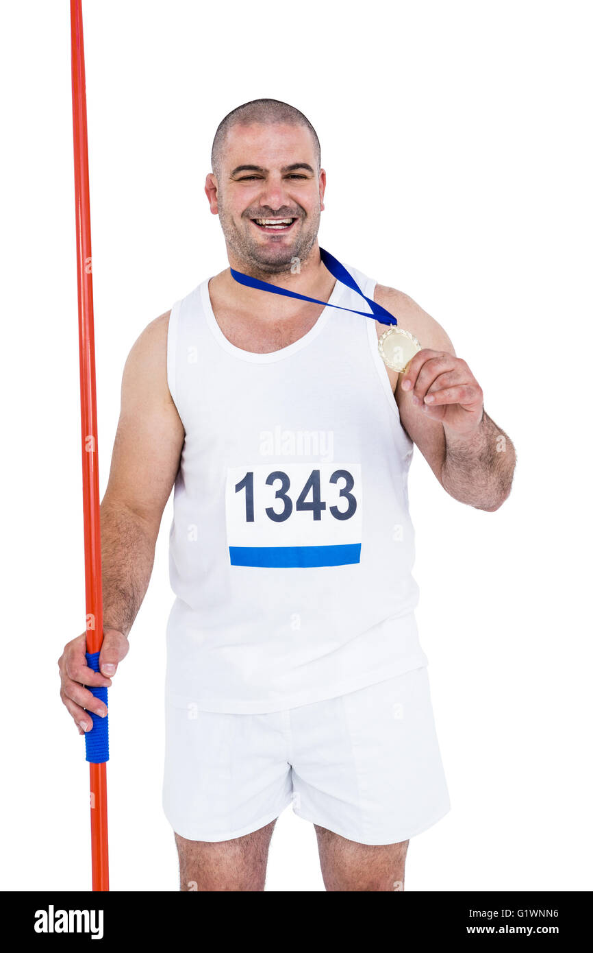 Athlete with olympic gold medal holding javelin Stock Photo Alamy