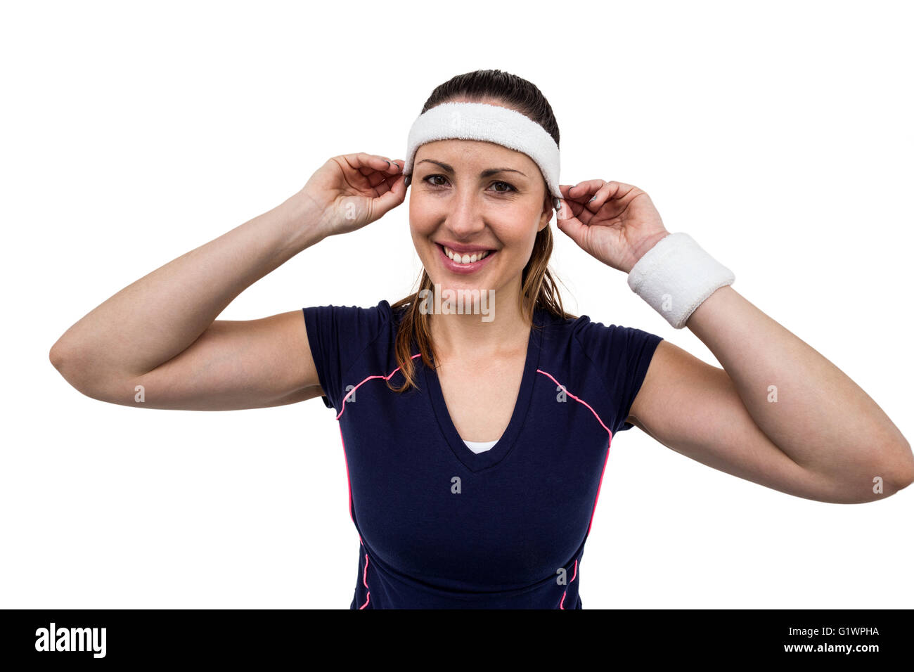 Female athlete wearing headband and wristband Stock Photo Alamy