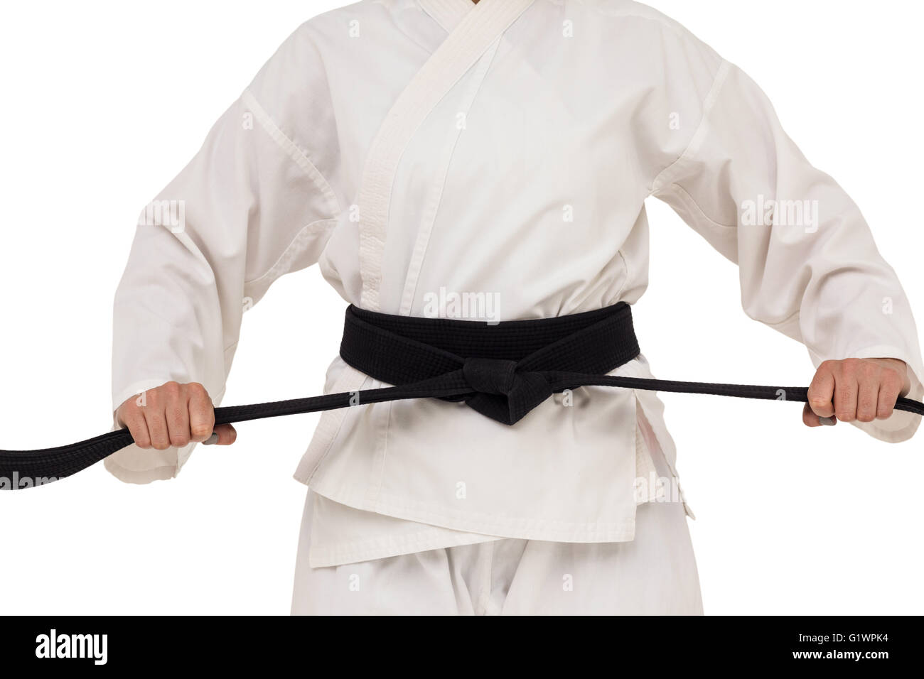 Fighter tightening karate belt Stock Photo Alamy