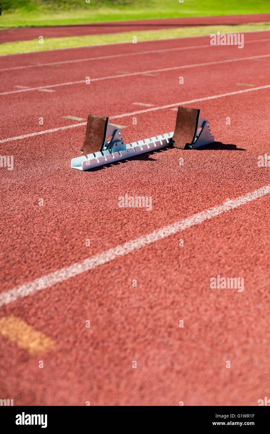 Starting block on a running track Stock Photo Alamy