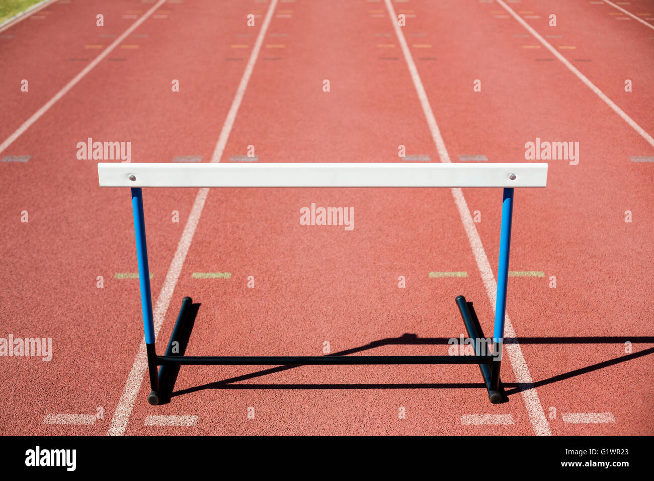 Hurdle on running track Stock Photo Alamy