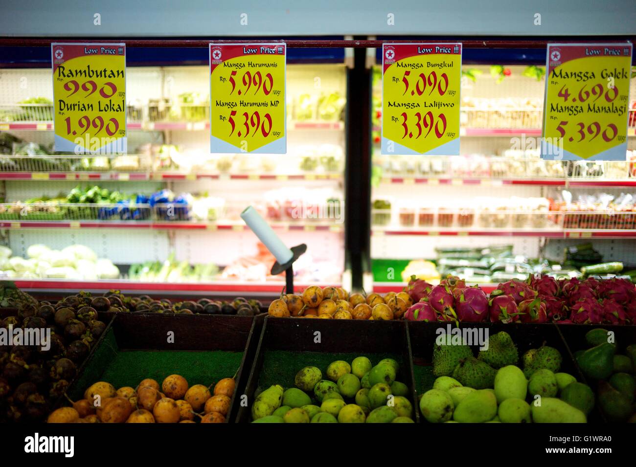 Fruit and vegetable on sale in a modern indoor supermarket in the town of Lombok on the island of Bali in Indonesia. Stock Photo