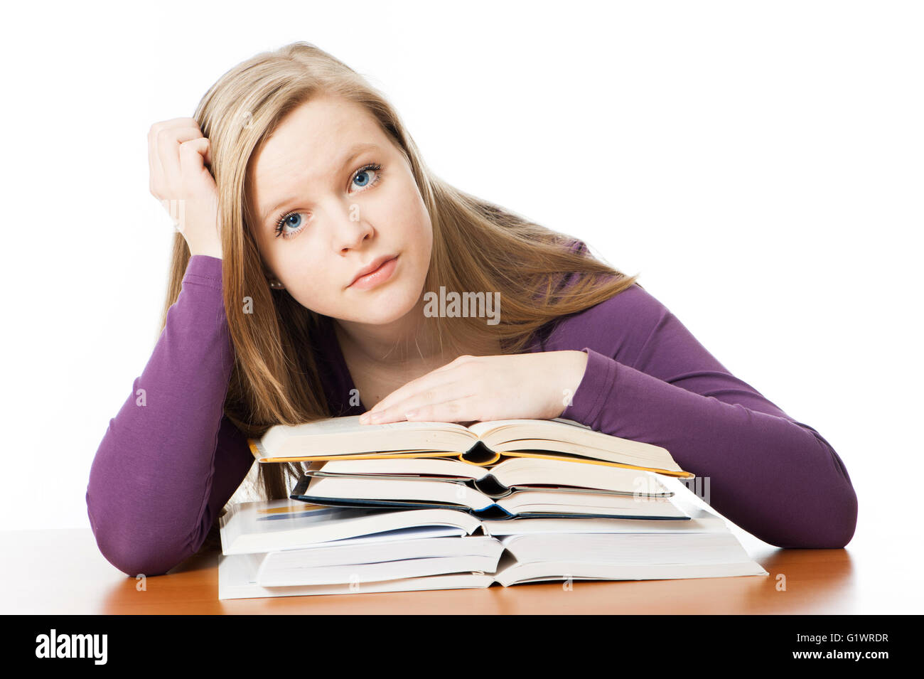 Young girl with books isolated on white Stock Photo - Alamy