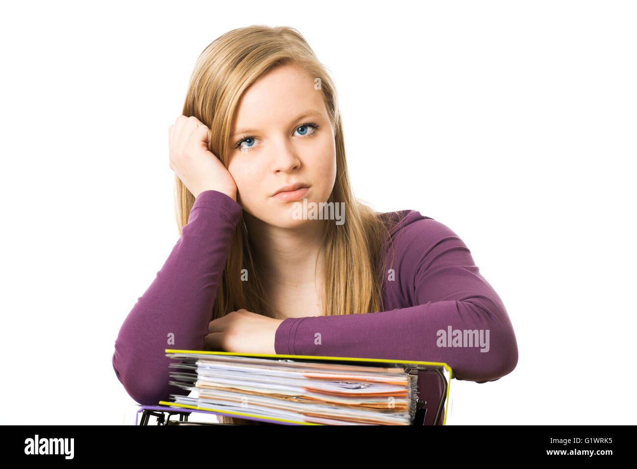 Schoolgirl with books isolated on white Stock Photo - Alamy