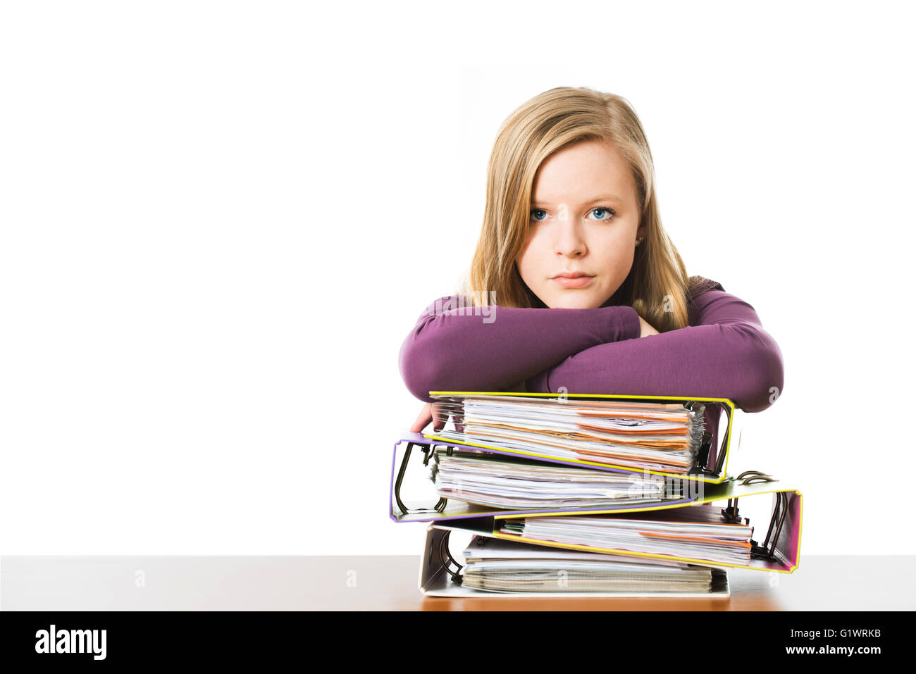 Schoolgirl with books isolated on white Stock Photo - Alamy
