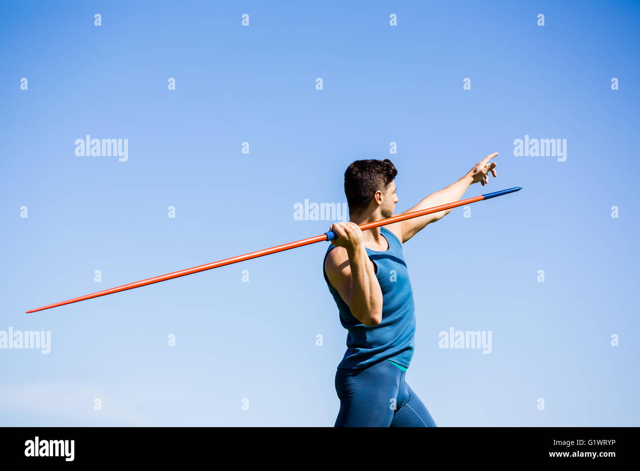 Athlete about to throw a javelin Stock Photo