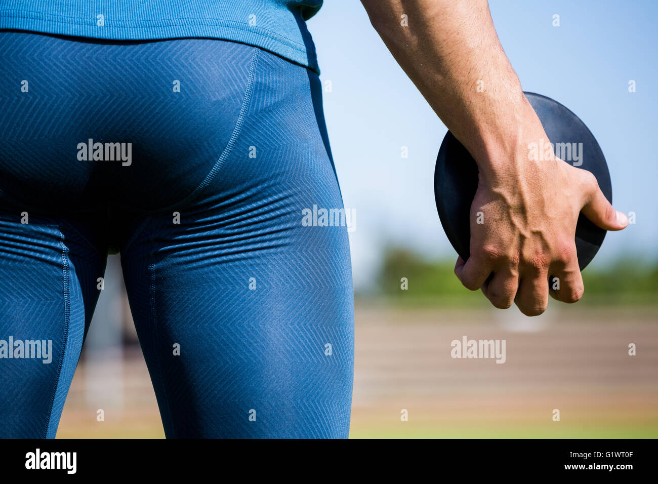Athlete holding a discus Stock Photo