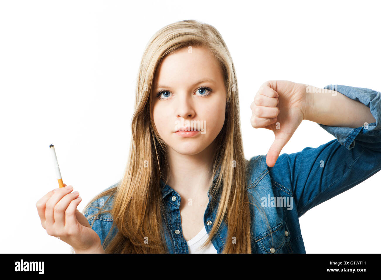 Teenage girl with cigarette isolated on white Stock Photo