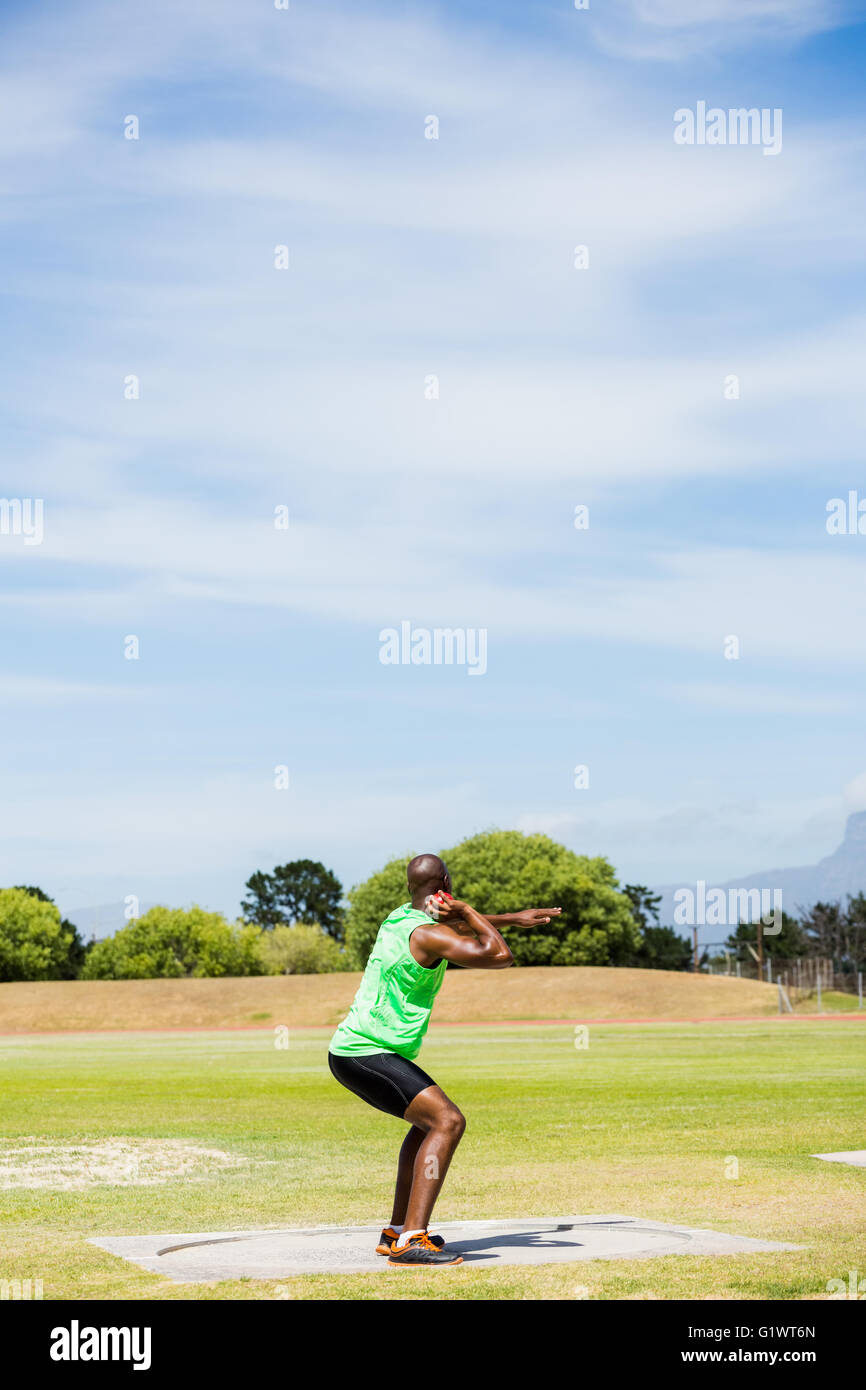 Male athlete preparing to throw shot put ball Stock Photo Alamy