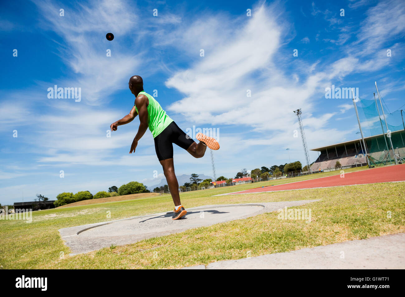 Male athlete throwing shot put ball Stock Photo Alamy