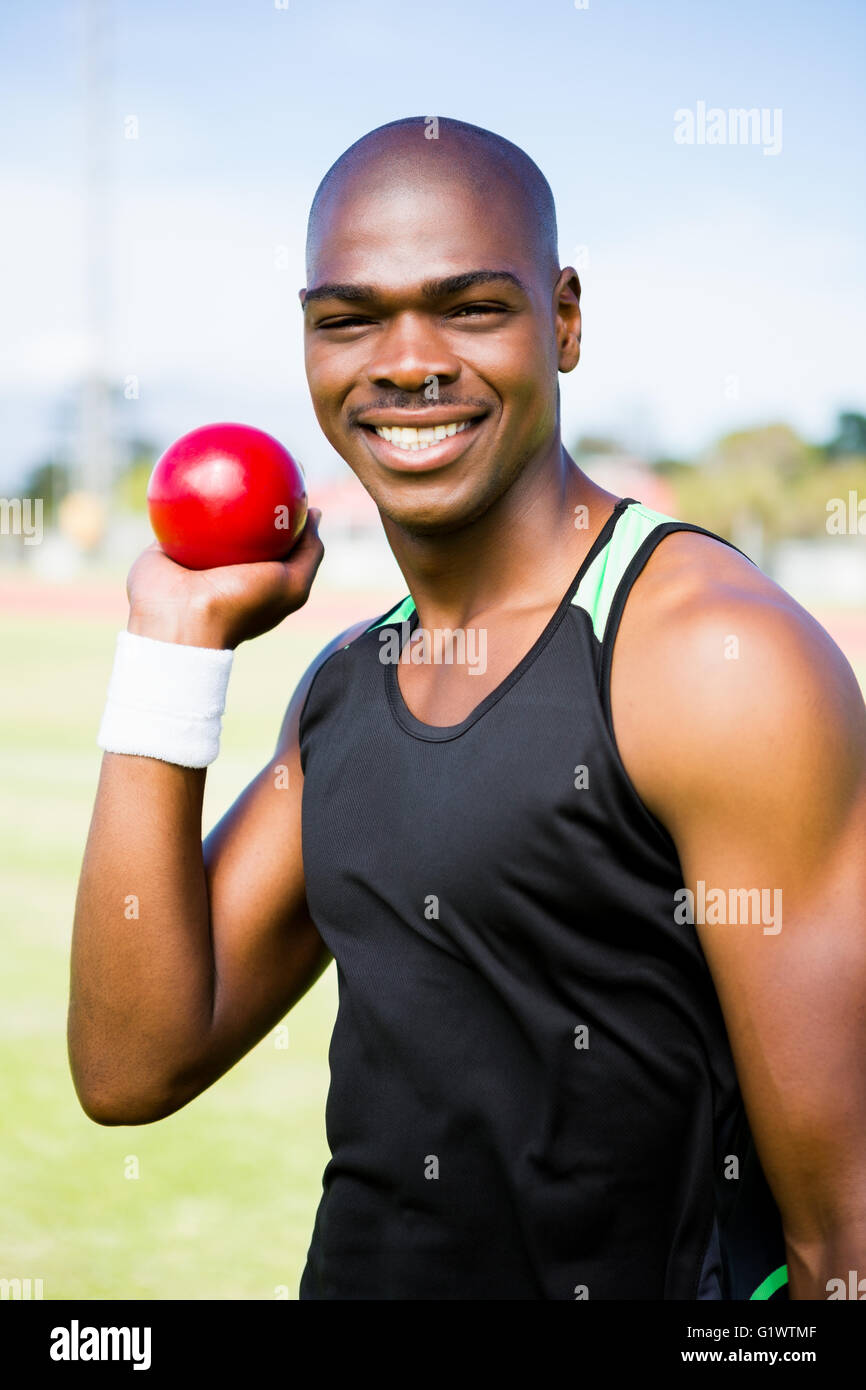 Male athlete preparing to throw shot put ball Stock Photo Alamy