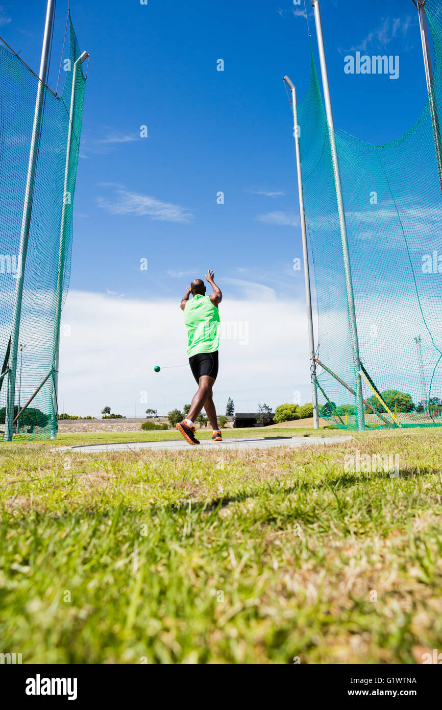 Athlete performing a hammer throw Stock Photo Alamy