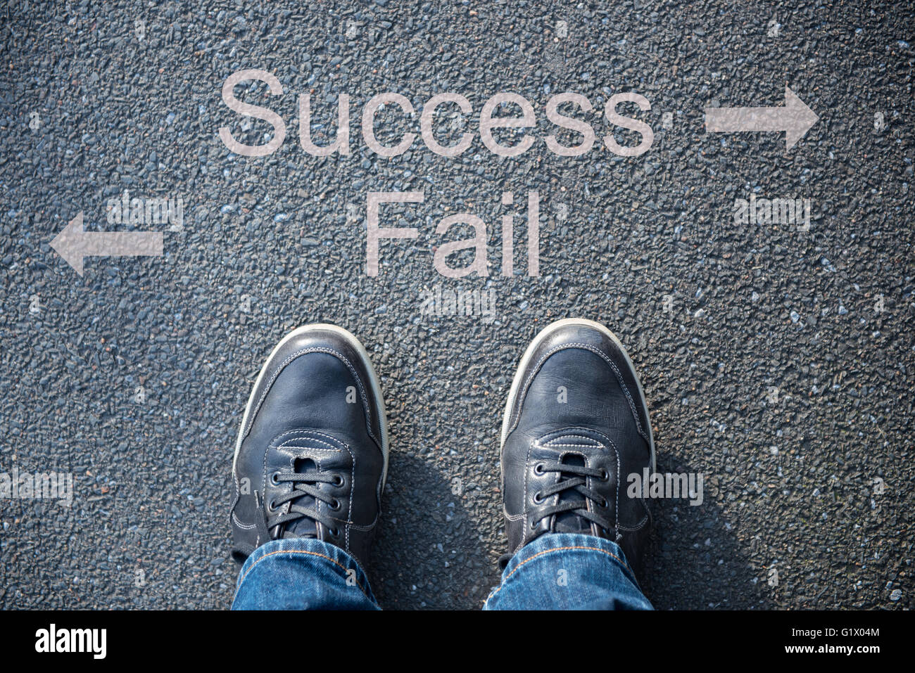 shoes on the street as symbol for success or fail Stock Photo