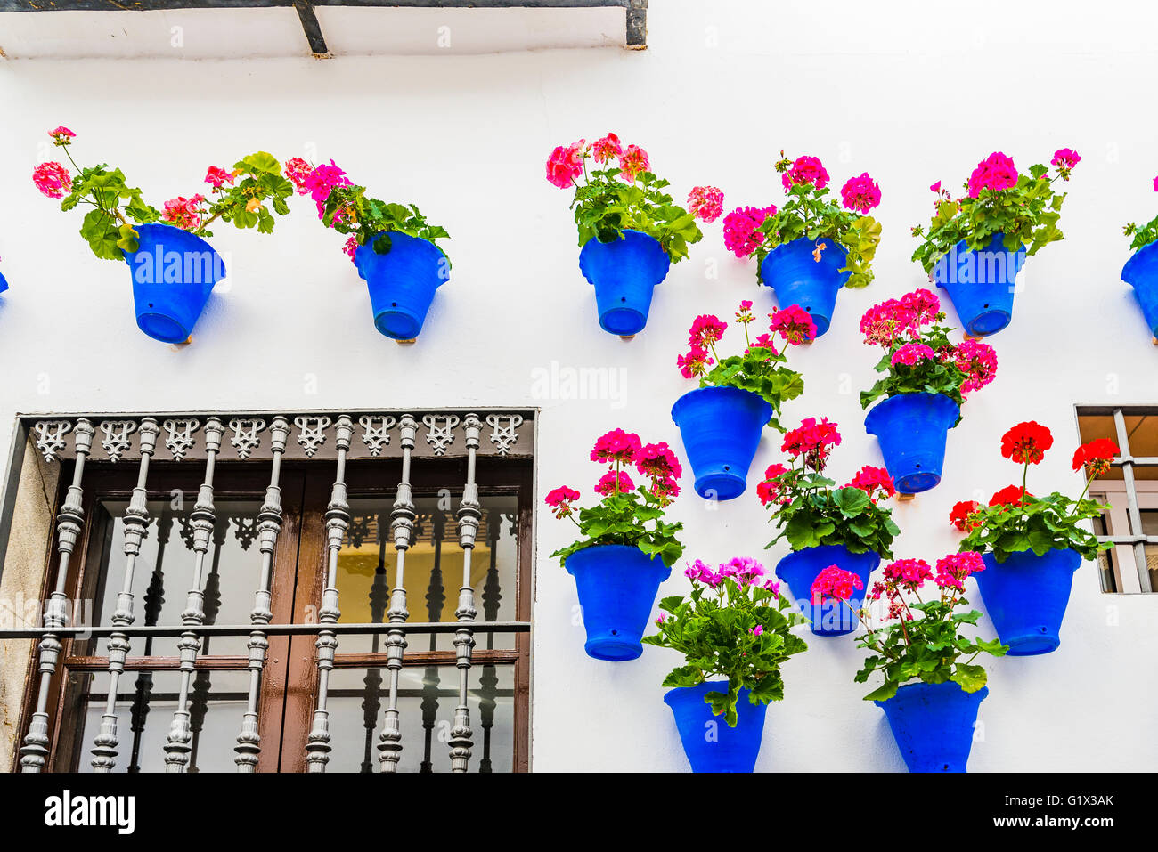Colorful balconies are part of the traditional architecture of the Cordovan houses. Córdoba, Andalusia, Spain, Europe Stock Photo