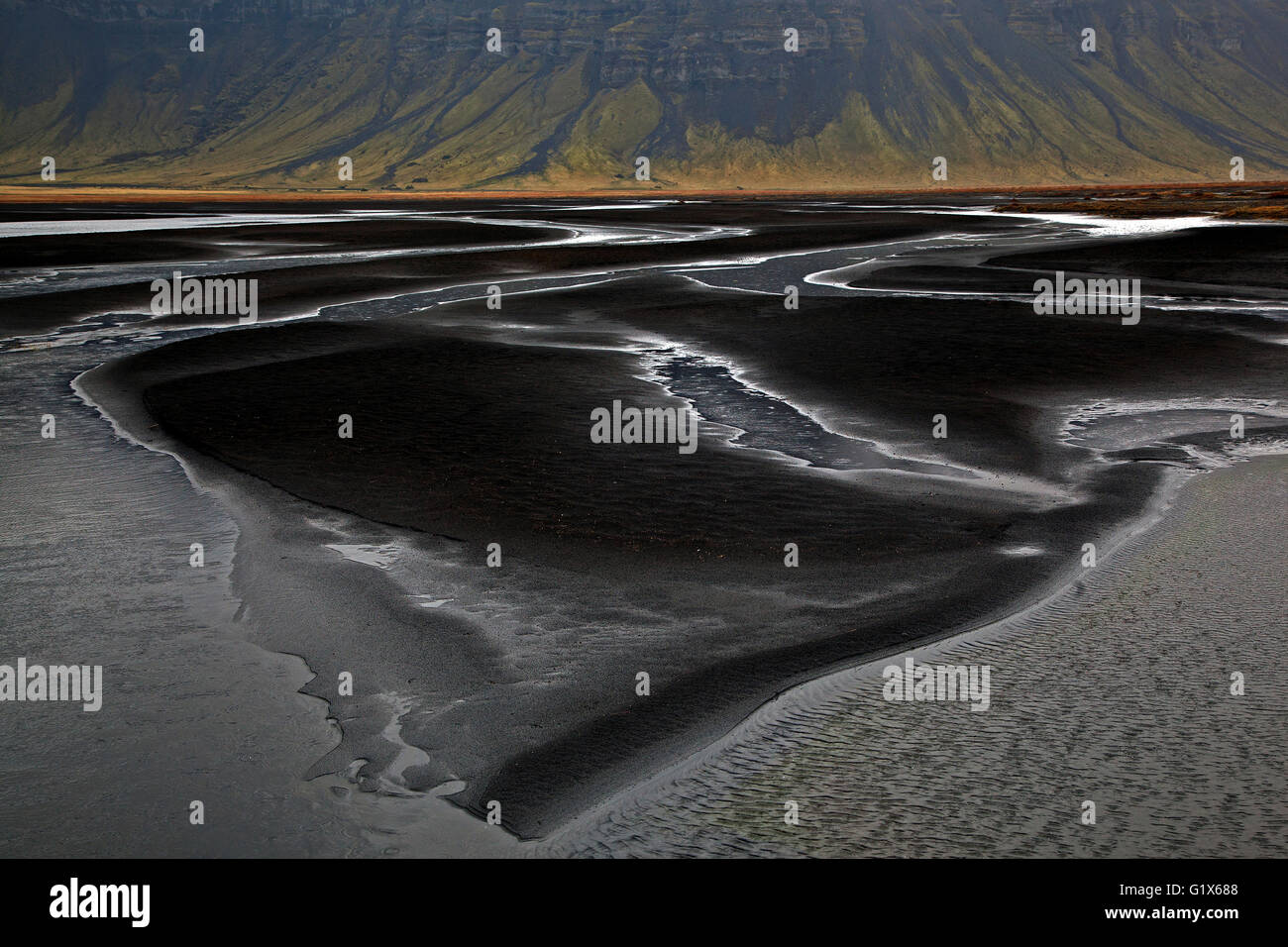Landscape with watercourses through vulcanic sand, in Nupsstadur or Núpsstaður, Southern Region, Iceland Stock Photo